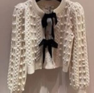 Cream Knit Cardigan with Black Accent